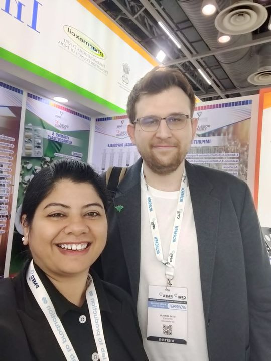 A visitor with a team member at CPHI 2025
